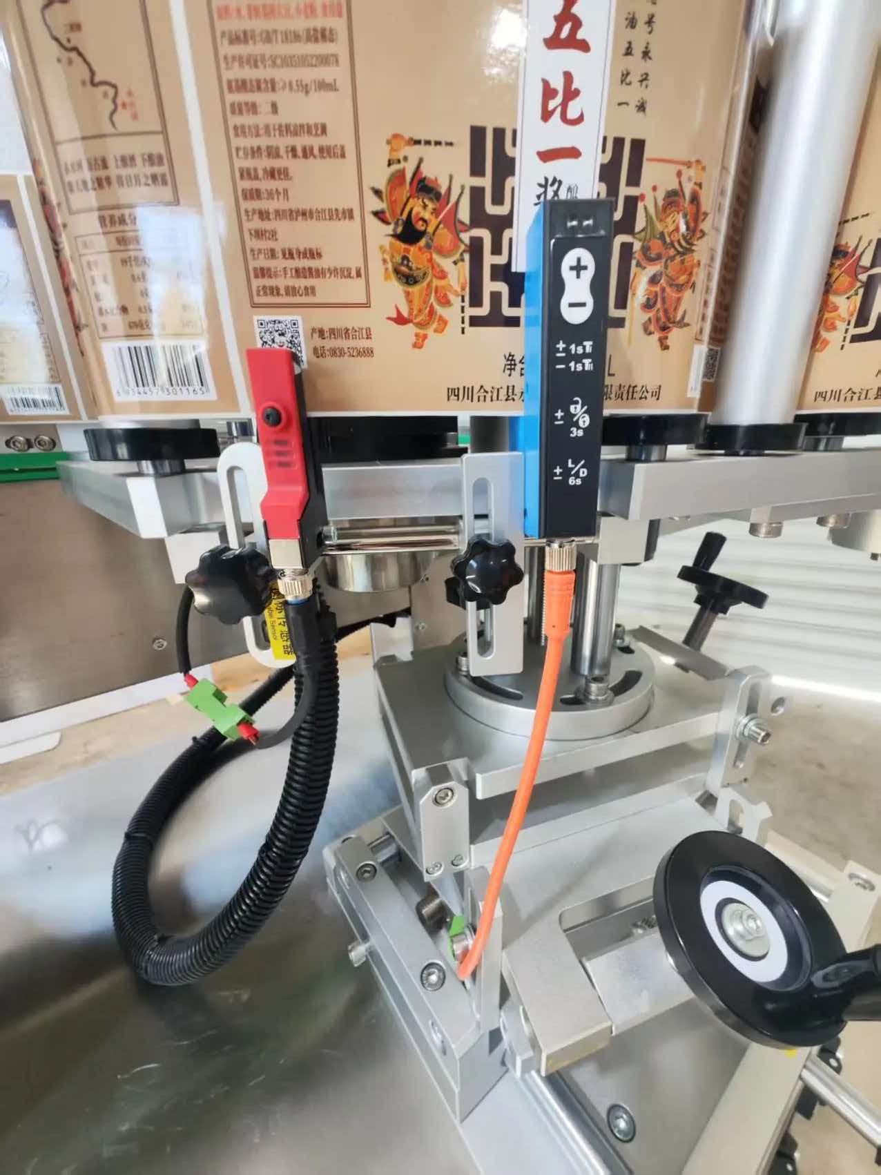 Transparent label machine control and conveyor